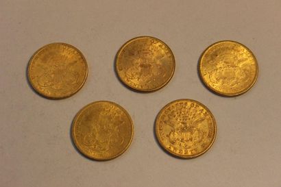 null A collection of five 20-dollar gold coins, one from 1873, one from 1877, two...