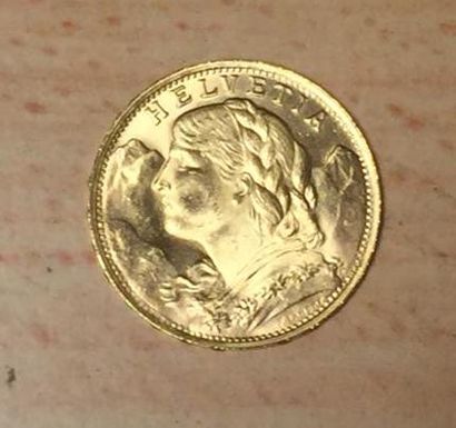 null Une pièce 20 Francs Suisse en or Confédération 1947, poids : 6,4g.