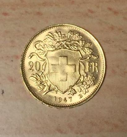 null Une pièce 20 Francs Suisse en or Confédération 1947, poids : 6,4g.