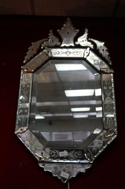 null Octagonal Venetian mirror in engraved glass with flower decoration, foliage...