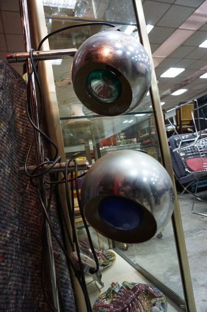 null Chrome-plated metal floor lamp with two globe-shaped lights. Attached is a chromed...