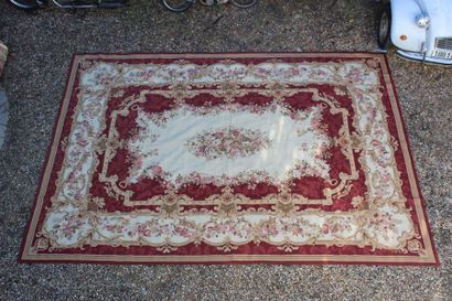 null *In the taste of the Soap Factory, large rectangular carpet with red background...