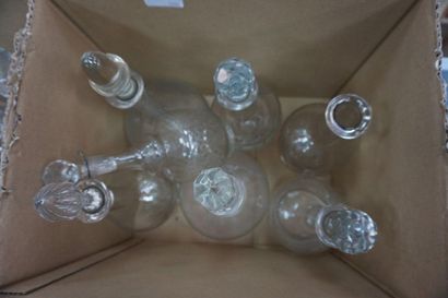 null Meeting of cut and engraved crystal decanters, including Moser, Baccarat (after)....
