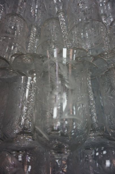 null Serving part of engraved crystal glasses with flower decoration.