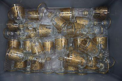null Serving part of gilded and engraved crystal glasses with rocaille decoration...