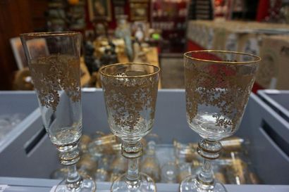 null Serving part of gilded and engraved crystal glasses with rocaille decoration...
