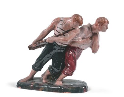 GUERO (XXe siècle) TWO MARINES SHOOTING A BIT Polychrome enamelled clay statuette.
Signed...