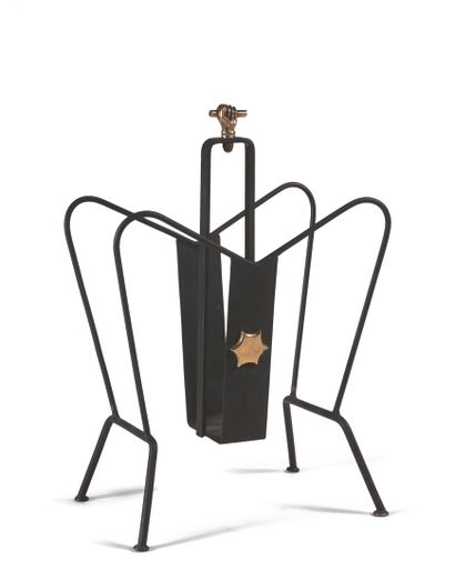 null PERRIER ET FILS PORTE-REVUES Black lacquered wrought iron, the handle in gilded...