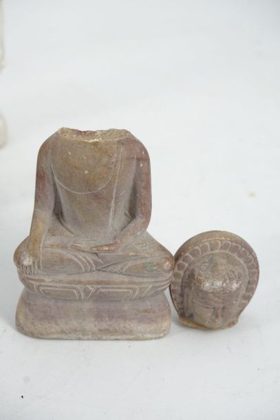 null Meeting of small Asian figurines made of wood and hard stone depicting priests,...