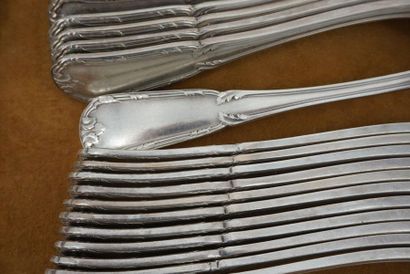 null Twelve large silver-plated metal cutlery decorated with foliated rushes, five...