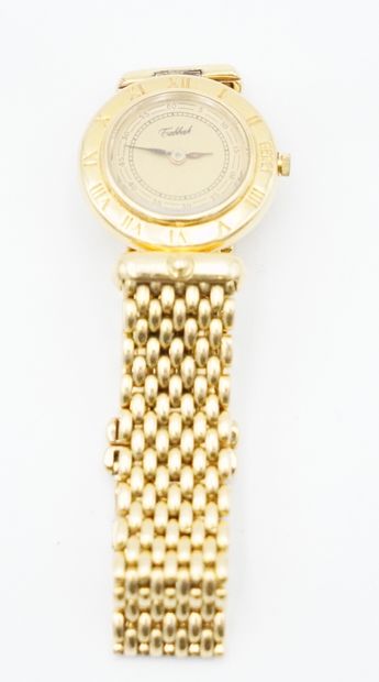 null * TABBAH, montre bracelet de dame, le boîtier et le bracelet en or jaune 18K...