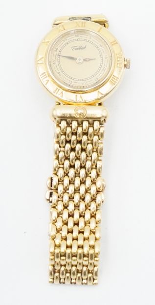null * TABBAH, montre bracelet de dame, le boîtier et le bracelet en or jaune 18K...