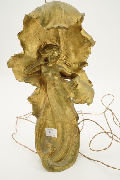 null H. LEVASSEUR, Femme lovée dans un élément feuillagé, sculpture en bronze doré...