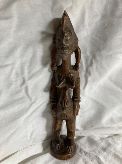 null Statuette féminine de type Senoufo, Côte d’lvoire Bois à patine brune

H : 28...