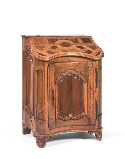 null ORATORY Moulded and carved wood, opening with a sloping flap, inlaid with geometrical...