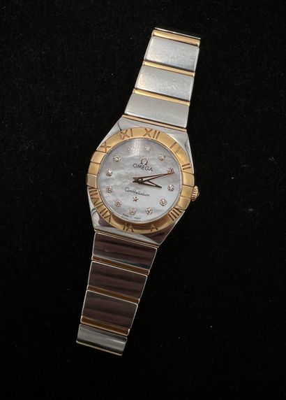 null OMEGA, modèle Constellation, montre bracelet de dame en or 18K (750) et acier,...