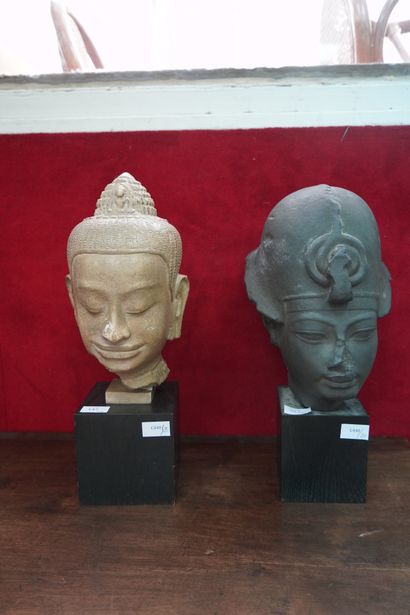 null Tête de Bouddha et tête égyptienne en matière composite.