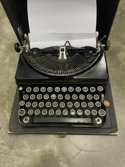 null REMINGTON

Machine à écrire portable modèle 5 T. Valise port.