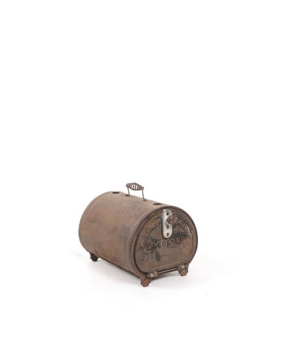 null THE CORN
ROTISSERIE
Cast iron and sheet metal, cylindrical shape, with handle.
Marked...