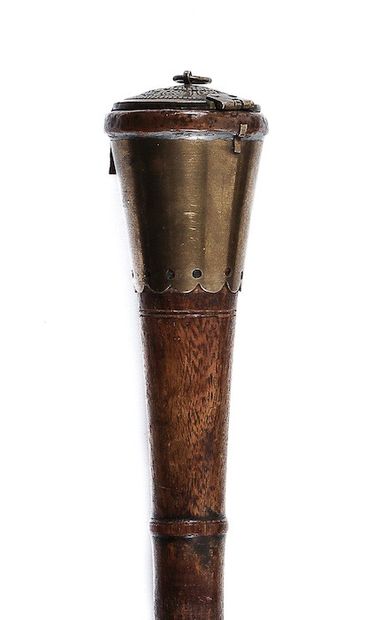 null CANE OF HEALER
The knob in brass and copper of conical form, with stylized floral...
