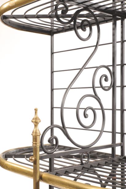null BAKERY GRILL, PARIS
Iron and brass with scrolls decoration,
on four openwork...