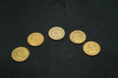 5 pièces de 20 francs or. Poids. 32,3 gr...