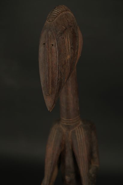 null Statue africaine en bois sculpté dans le goût Bambara.

Hauteur : 44 cm