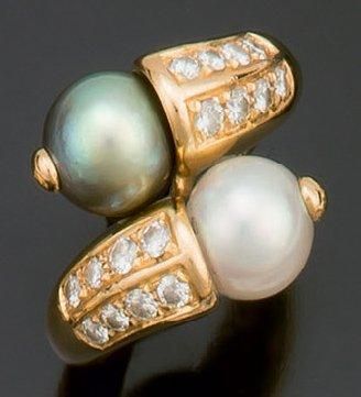 null Bague croisée en or jaune, ornée de deux perles de culture blanche ou grise...