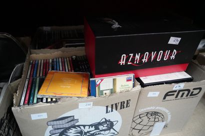 null Réunion de DVD et CD. 3 cartons et un coffret Aznavour.