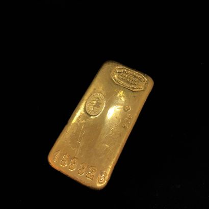 null Lingot d'or n°159,926. 996,4 millièmes. Poids brut. 999,4 g. Poids de l'or fin....