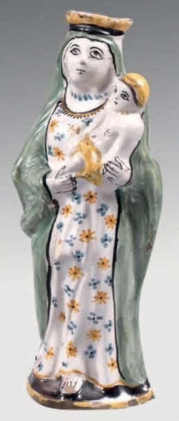 NEVERS Statuette de la Vierge à l'Enfant en faïence à décor polychrome de grand feu....