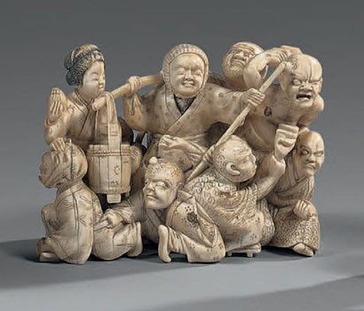 JAPON EPOQUE MEIJI (1868 - 1912)
OKIMONO en ivoire, groupe d'aveugles trébuchant.
H....