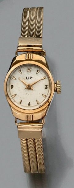 LIP Bracelet-montre de dame en or jaune cadran circulaire émaillé, bracelet en or...