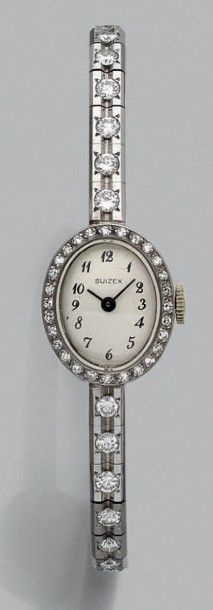 SUIZEX Montre bracelet de dame en or gris 750 millièmes, la montre de forme ovale,...