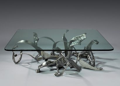 Albert FERRAUD (1921-2008) 
Table basse à piètement sculptural en acier.
Le plateau...