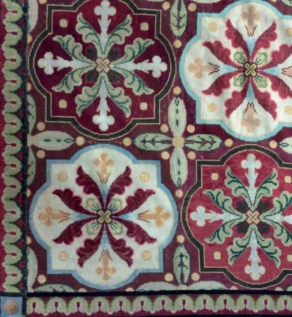 AUBUSSON 
Tapis en laine au petit point à motifs floraux dans des encadrements carrés...
