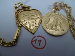 CHAÎNES DE COU - Chaîne de cou retenant un pendentif en forme de cœur, en or jaune...