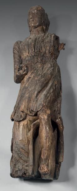 null Elément fragmentaire en bois sculpté représentant un personnage drapé, debout,...