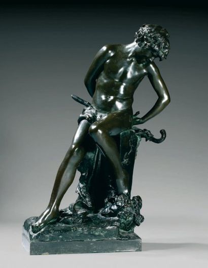 Félix CHARPENTIER (1858-1924) Faune au lézard Statuette en bronze patine brun-vert,...