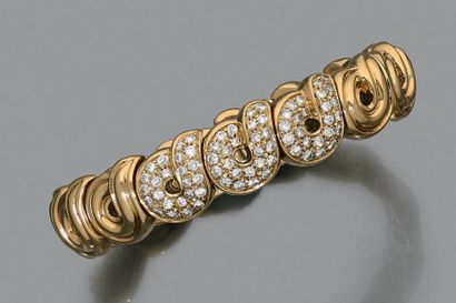 BOUCHERON Bracelet rigide ouvrant en or jaune 750 millièmes, les motifs à décor d'enroulements...