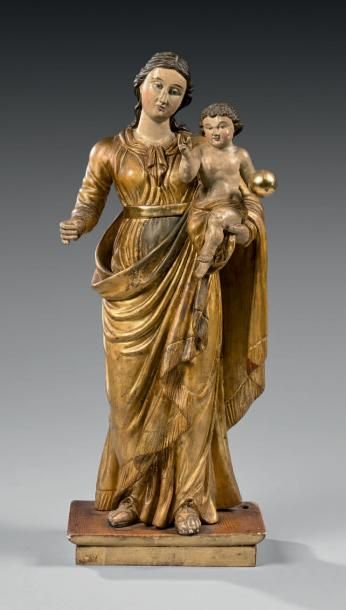 null Vierge à l'Enfant
Statuette
Bois sculpté repeint en polychromie et doré.
XVIIIe...