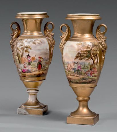 null Paire de vases balustre en porcelaine de Paris, la panse à décor de scènes paysannes...