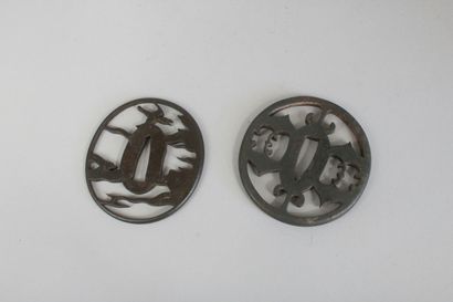 null Three sukashi tsuba marugata in iron, one decorated with ginger leaves, the...