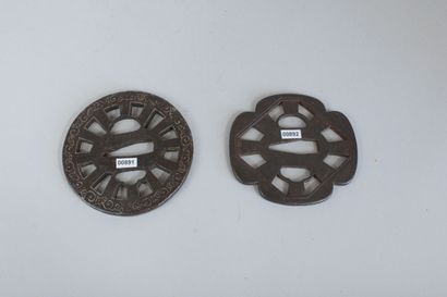 null Two iron tsuba, one maru-gata, wheel-shaped, inlaid with karakusa in sentoku;...