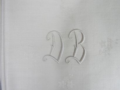 null Beautiful tablecloth and 12 napkins numbered D B in ivory damask thread decorated...