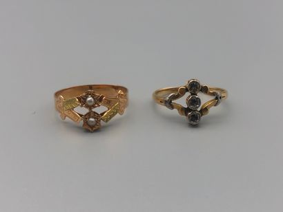 Two early 20th century gold rings set with...