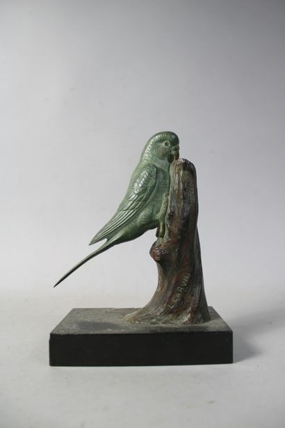 null Louis-Albert CARVIN (1875-1951) "Perroquet branché" subject in bronze on a marble...