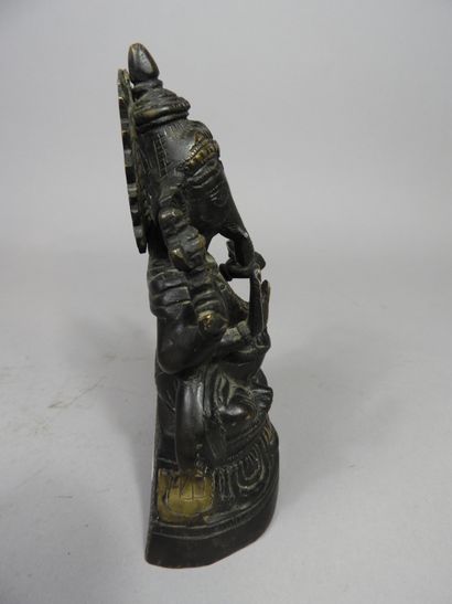 null Inde, XXe siècle
Sujet en bronze de patine sombre, représentant Ganesha à quatre...