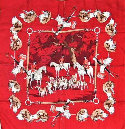 null HERMES Paris 
Square printed silk square representing the hunt on a red
background...