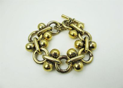 null PACO RABANNE
Bracelet en métal doré formé de maillons chaîne orné de boules....